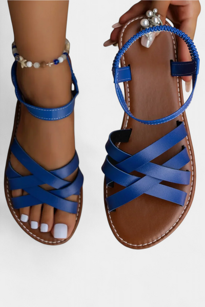 Sandalias planas Romee