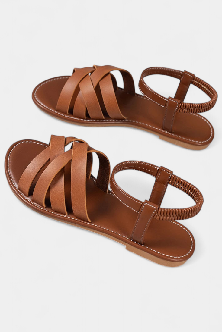 Sandalias planas Romee