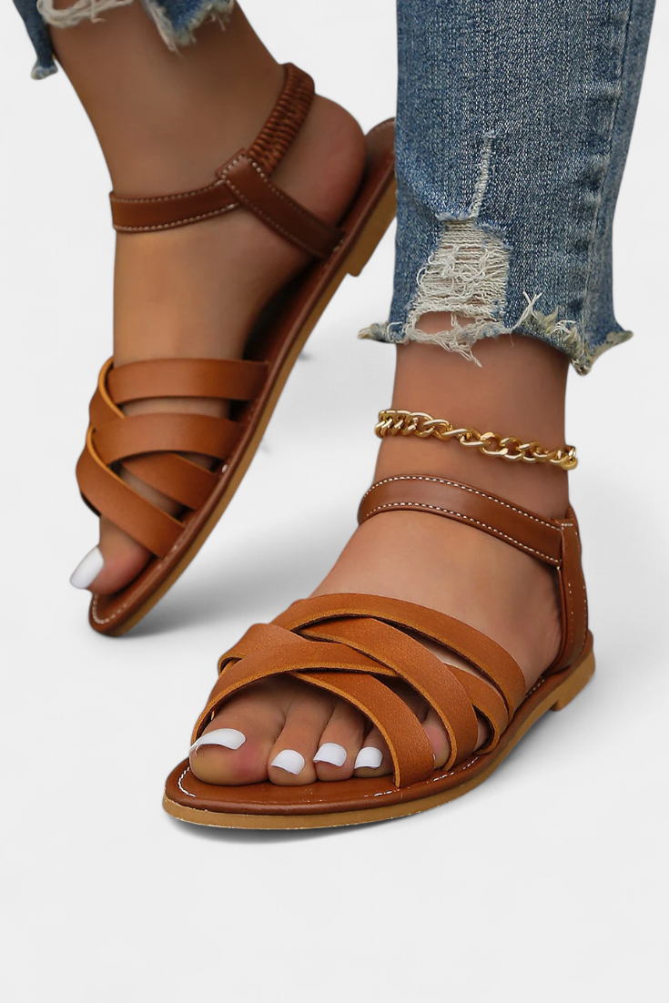 Sandalias planas Romee